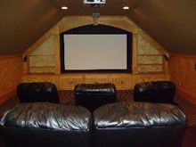 Projection TV in a local theatre room.